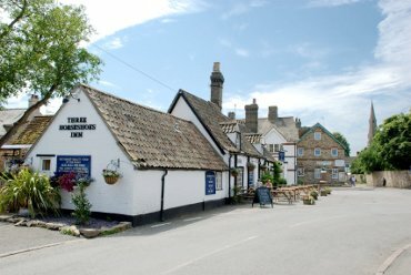 Photograph of the Three Horseshoes Inn, Houghton, Huntingdonshire, England