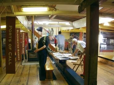 Photograph of the exhibition below decks on Thames sailing barge '' at Hythe Quay, Maldon, Essex, England