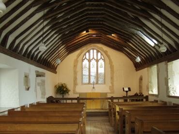 Scene showing St. Swithun's Church in Kings Gate, Winchester, Hampshire (Hants), England